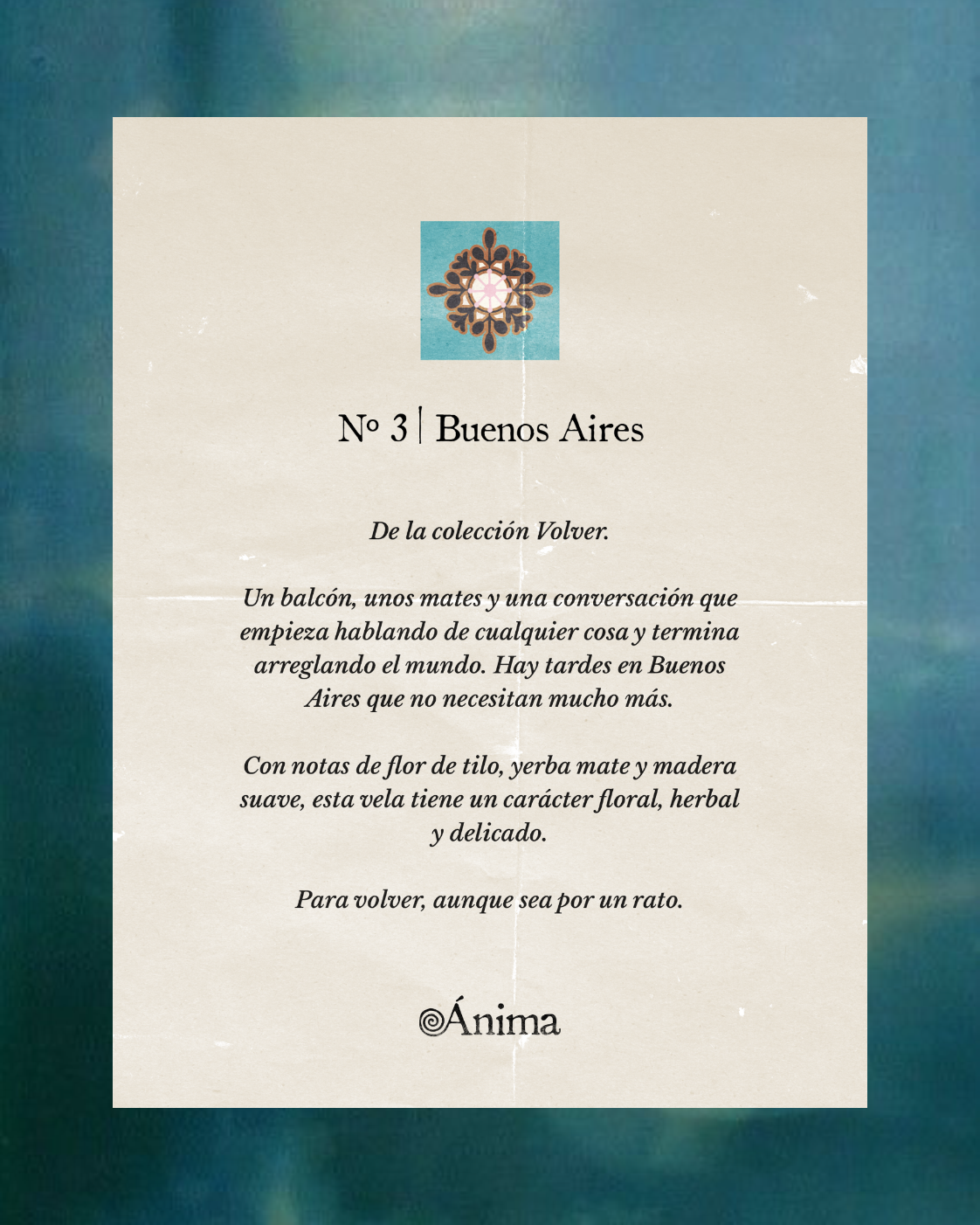 Printed card with decorative symbol at top and text titled 'No 3 | Buenos Aires' describing a candle from the Volver collection with scents of linden flower, yerba mate, and soft wood, evoking a floral, herbal, delicate character and moments on a balcony in Buenos Aires. The card ends with 'Ánima' at the bottom.