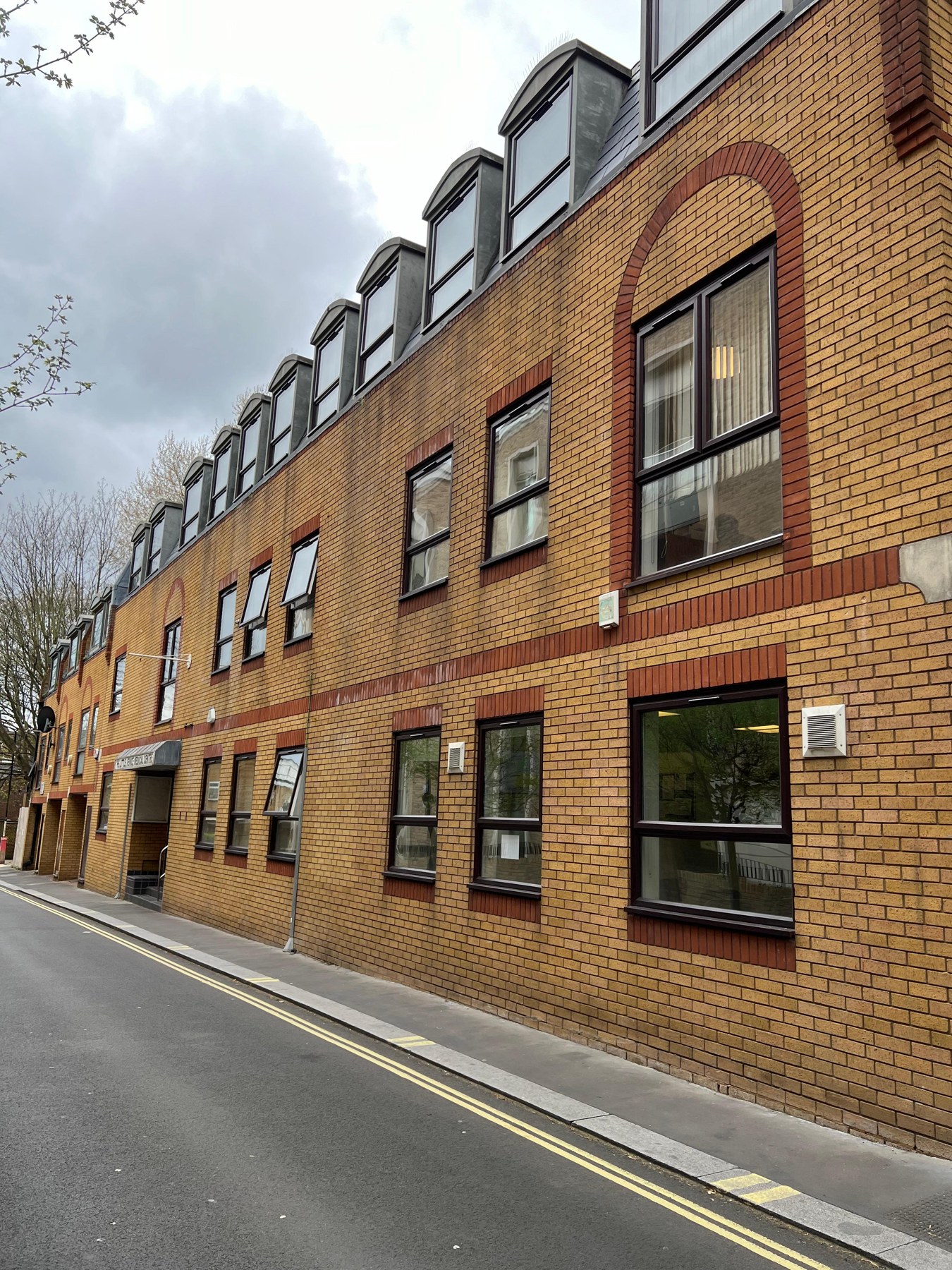 Brick building exterior featured in the Kore Commercial brochure