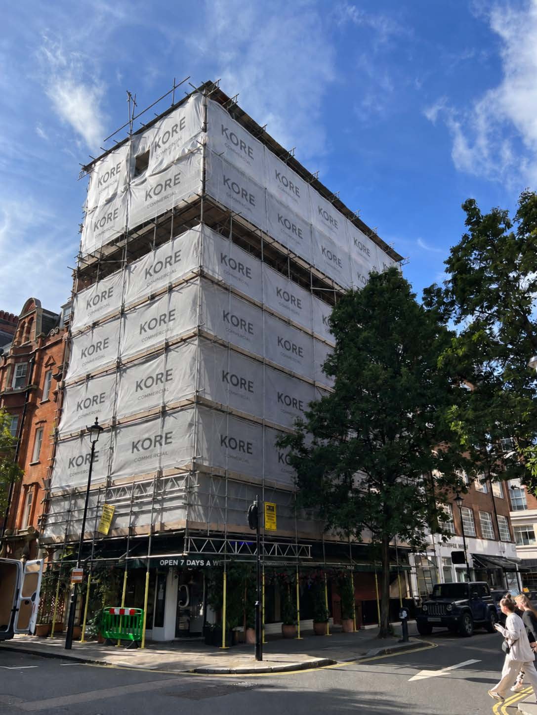 Kore-branded scaffolding around a London building