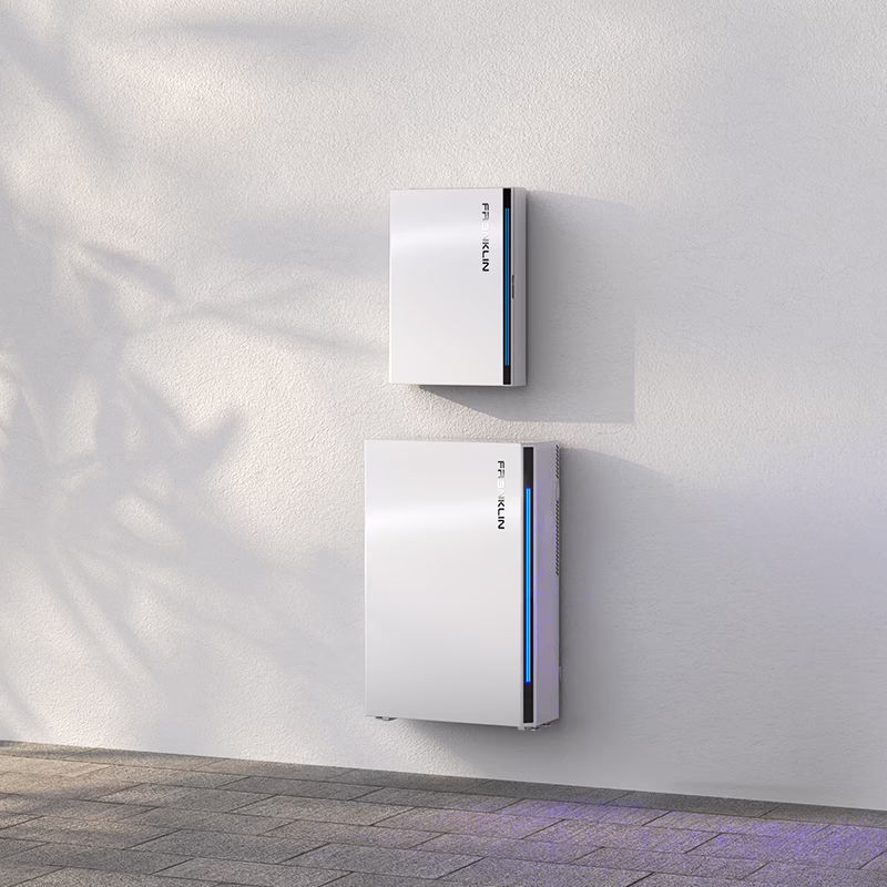 FranklinWH aGate controller mounted above an aPower battery on an exterior wall