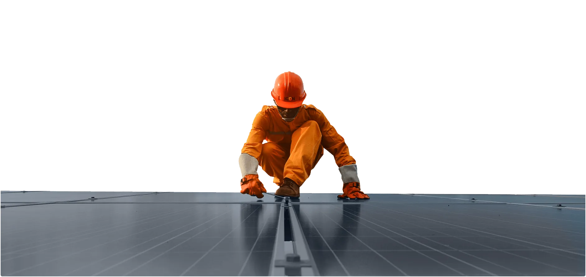 Icon Power installer in an orange hard hat securing rooftop solar panels