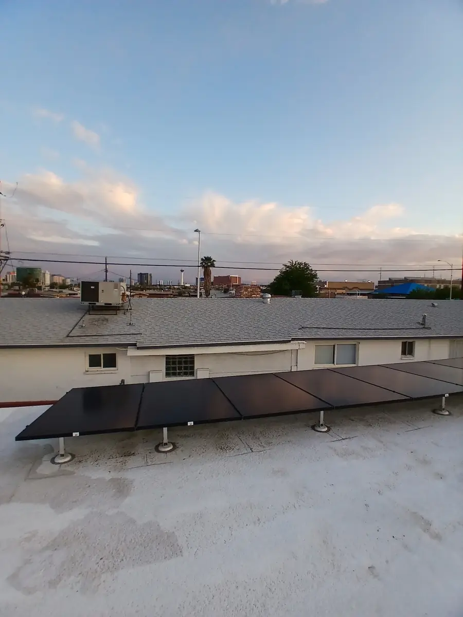 Tilted solar panels on the flat roof of a Nevada home installed by Icon Power