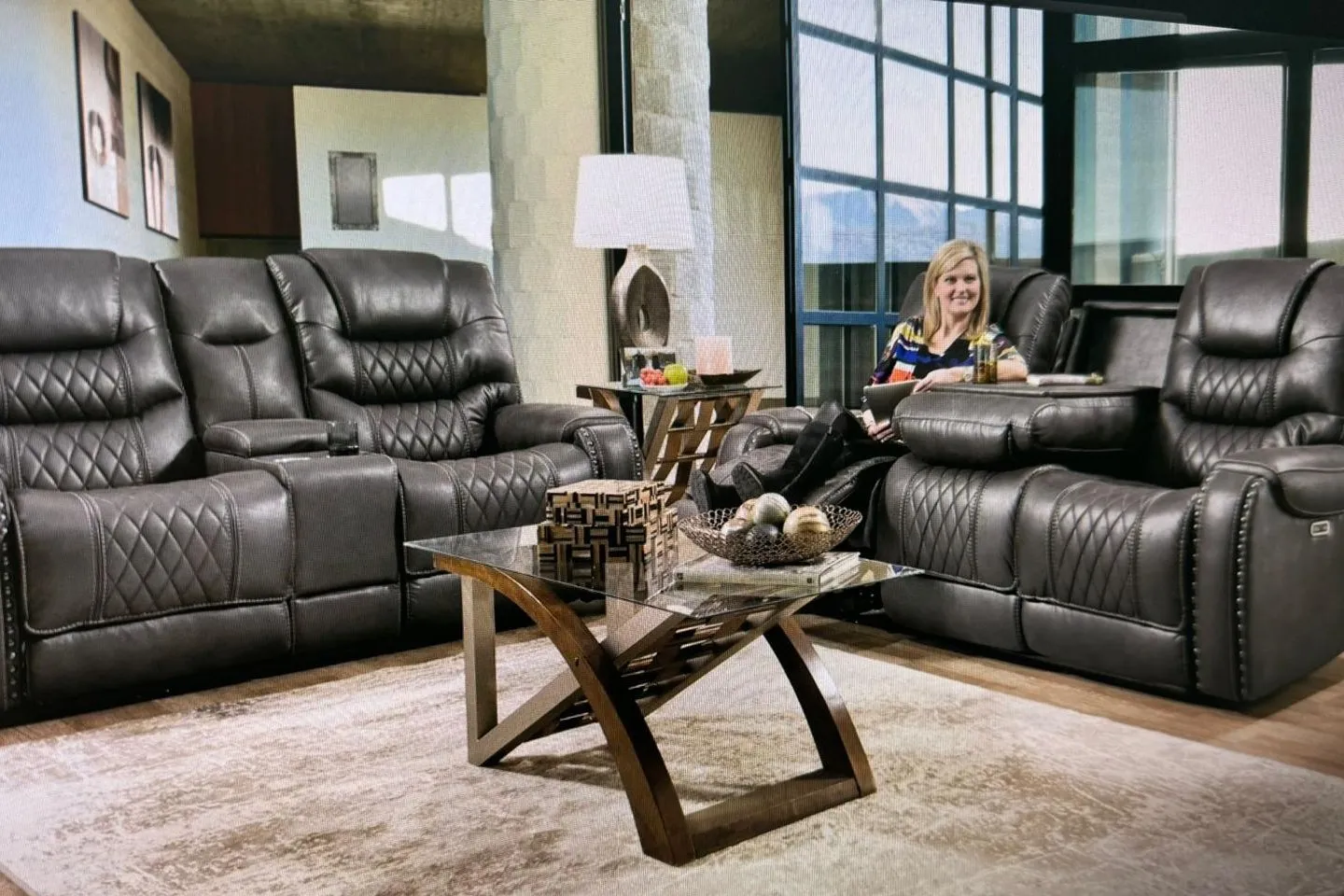 Charcoal reclining sofa and console loveseat with diamond-stitched seats