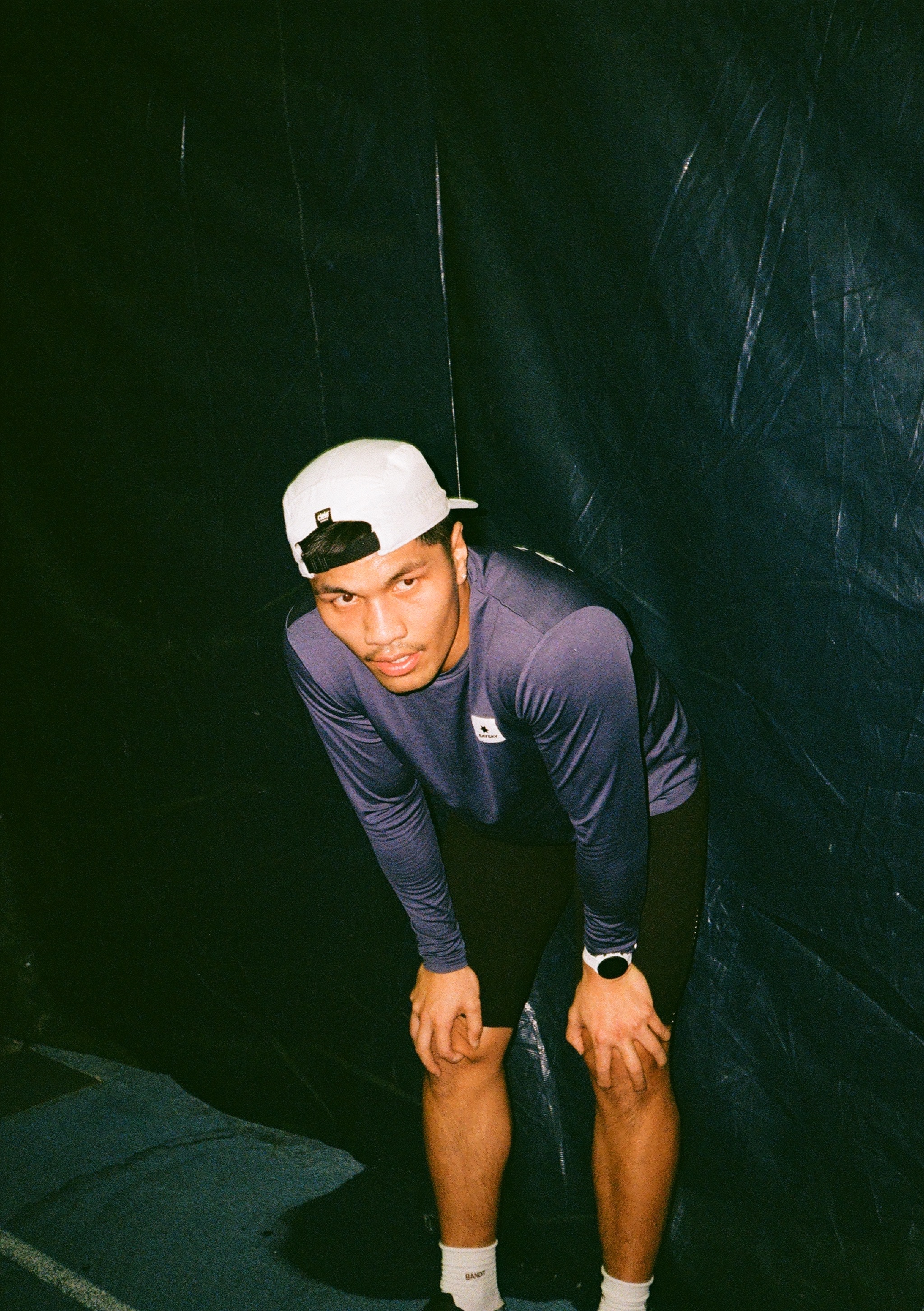 Ralph, a Recovery Labs creator, leaning forward with his hands on his knees