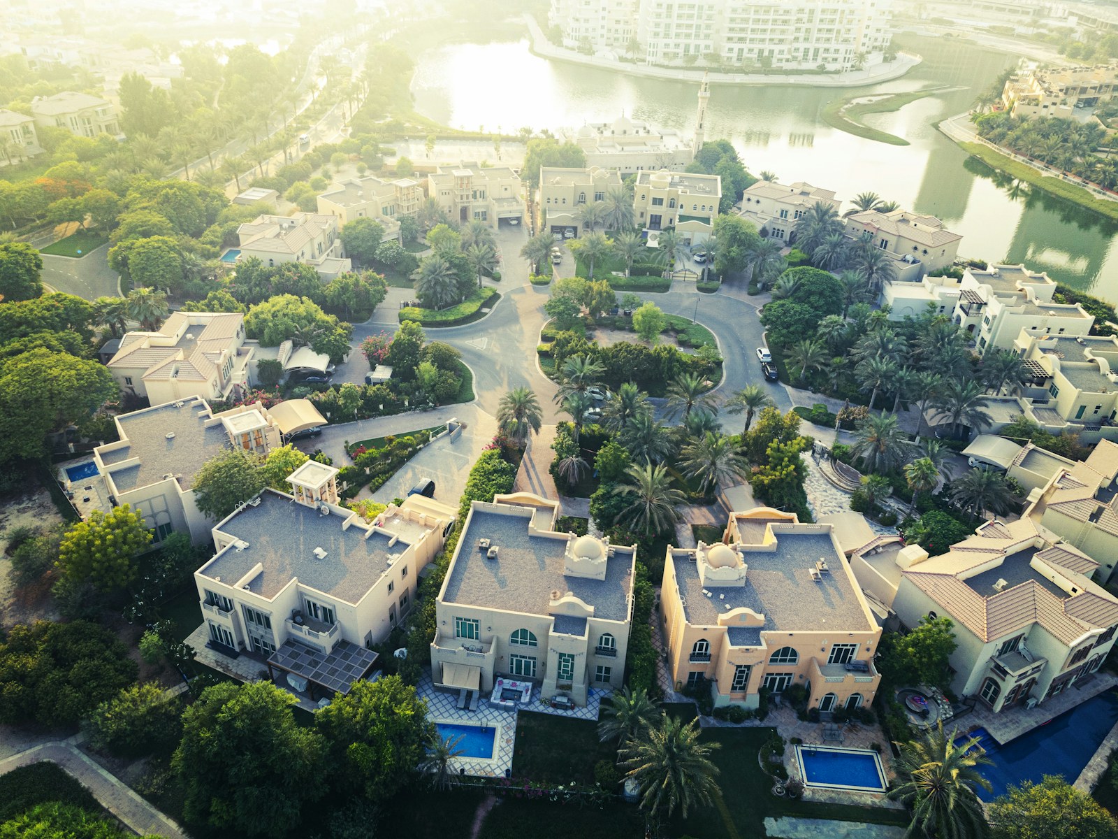 An aerial view of private villas and landscaped gardens in Dubai