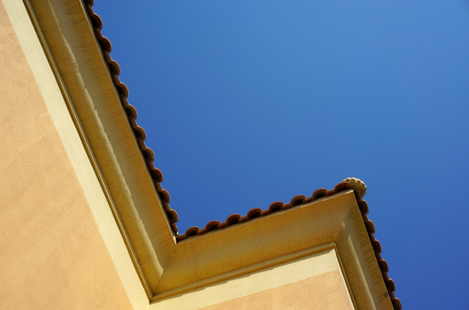 Traditional roof detail against the Dubai sky