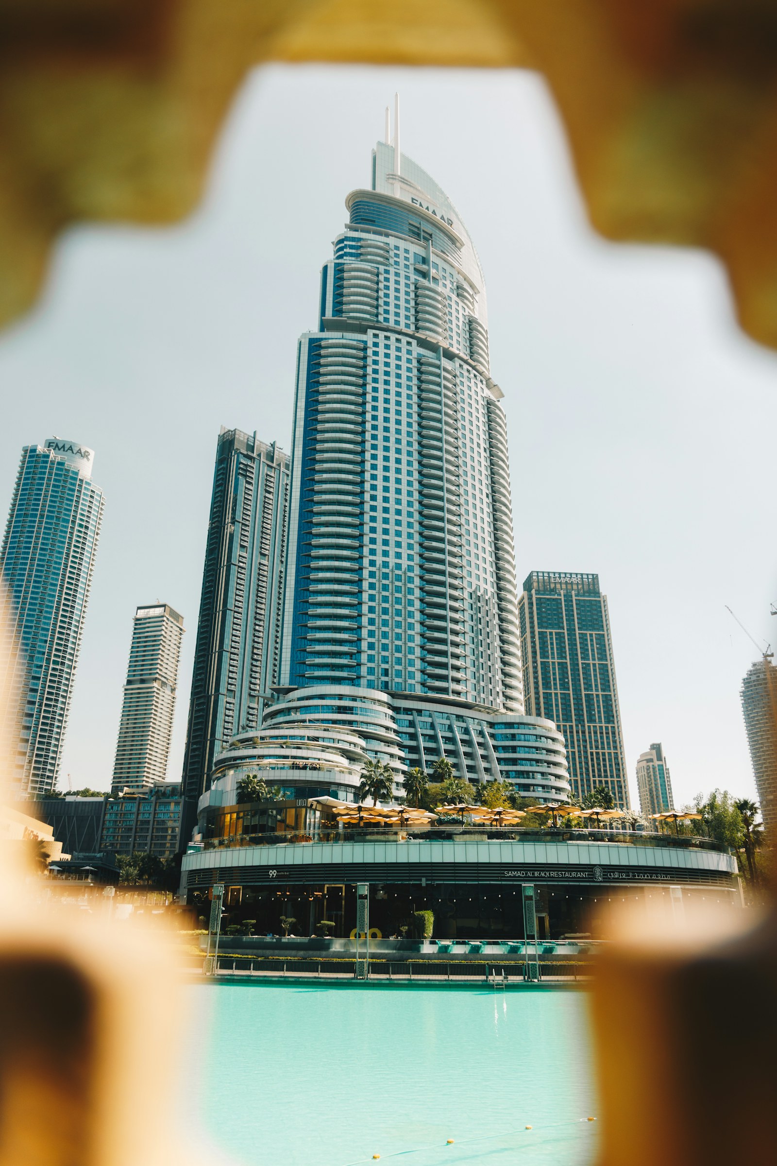 Contemporary commercial tower reflected in Dubai Creek
