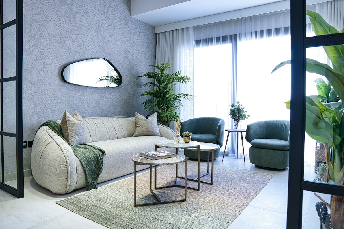 Modern living room with green chairs