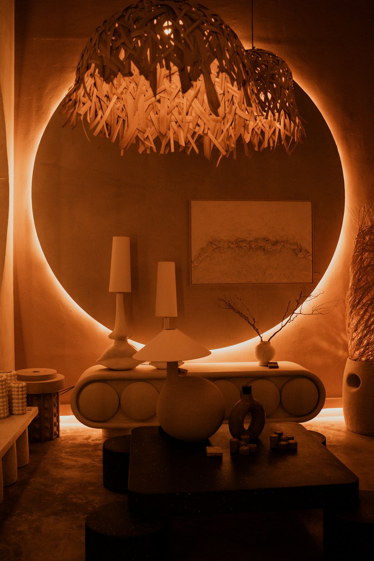 Living room with a circular mirror