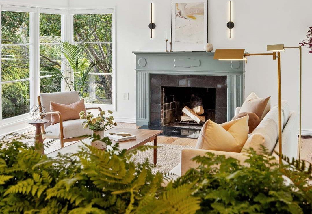 Sterling Drive living room, fireplace seen through ferns