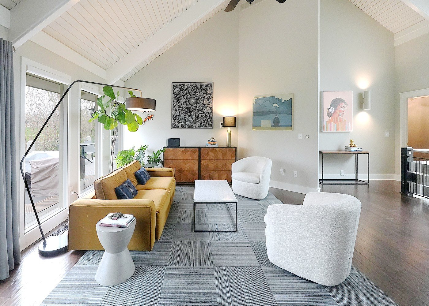 Muirfield living room under a vaulted plank ceiling