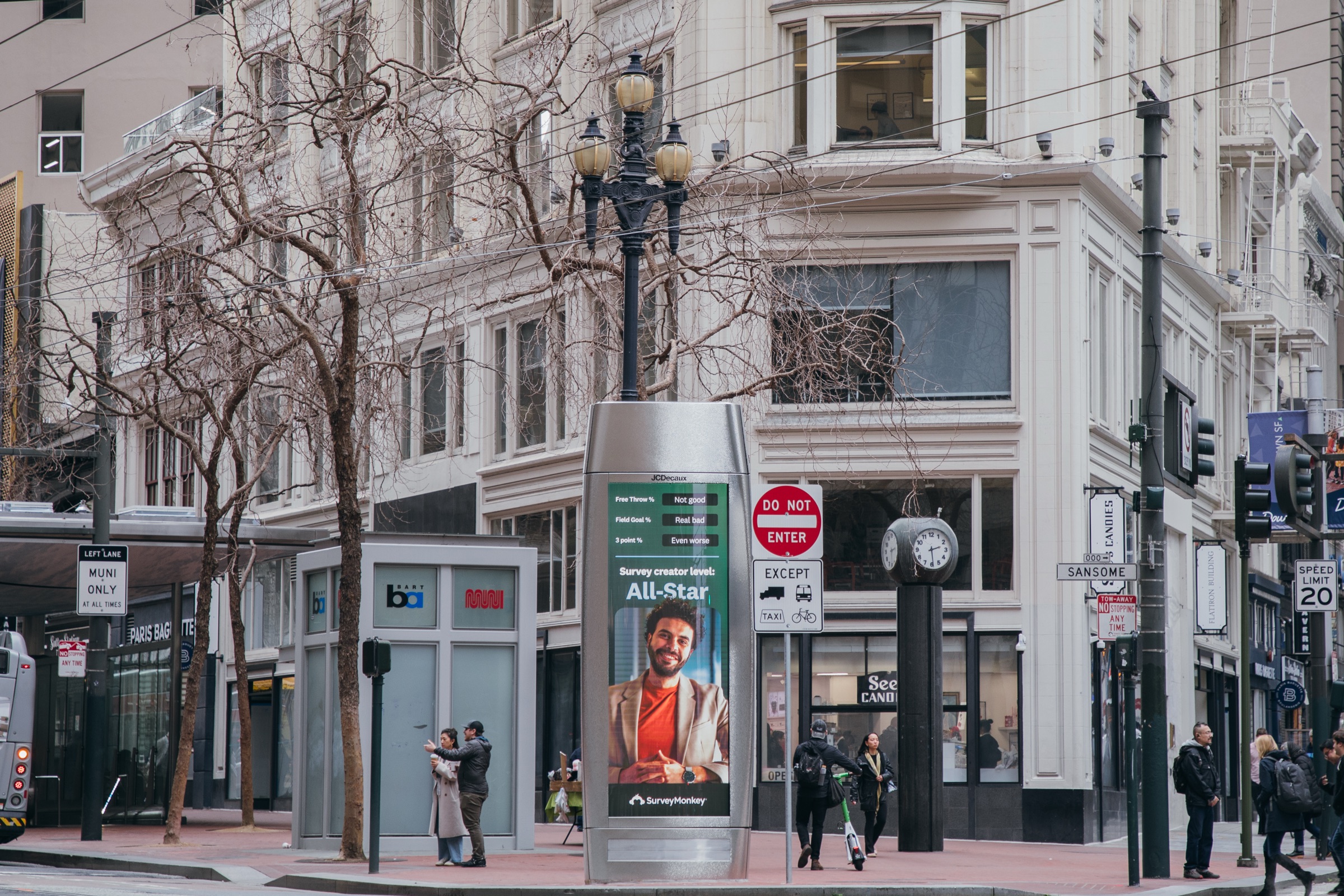 Market Street kiosk showing a SurveyMonkey All-Star ad