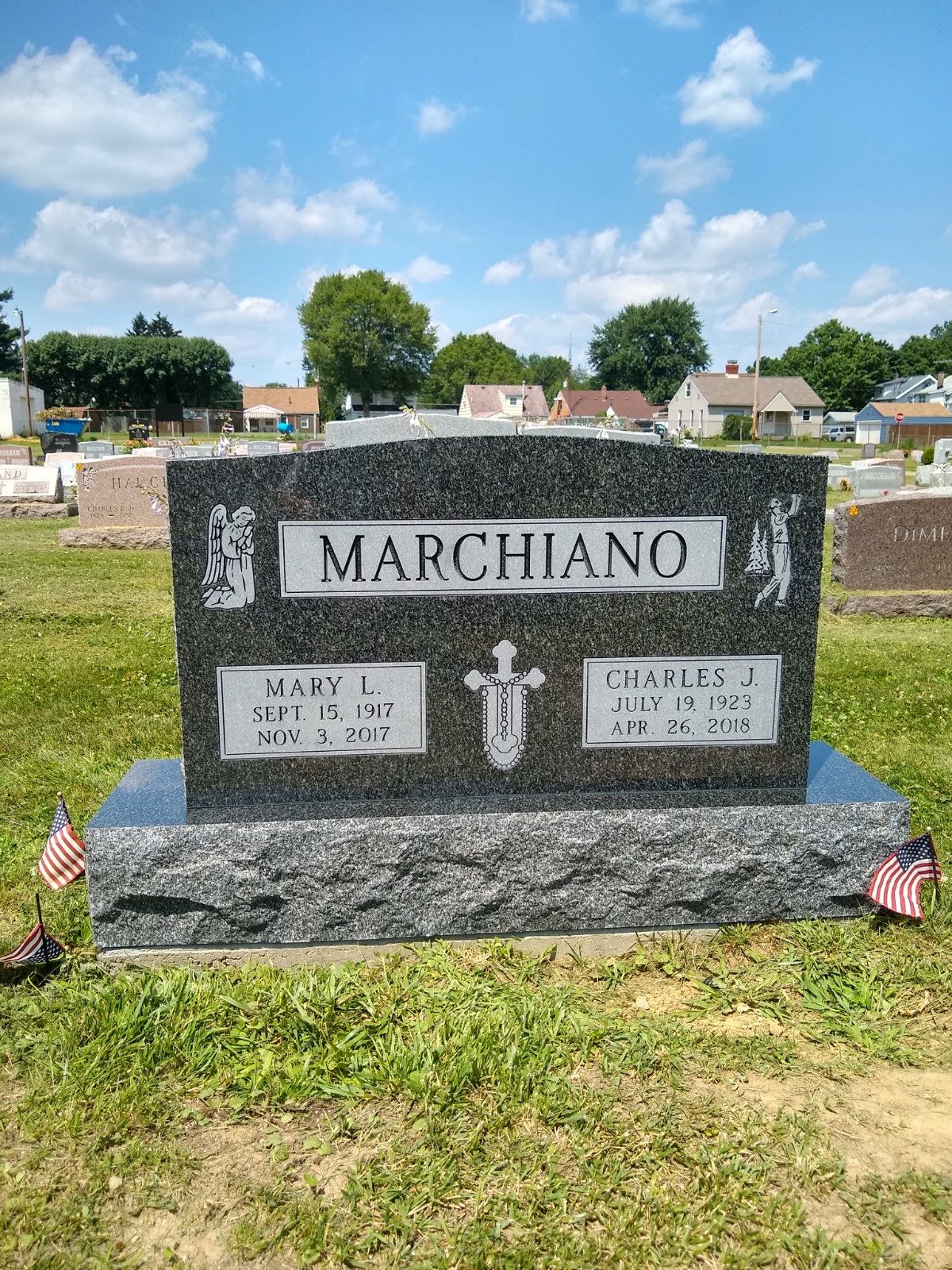 Granite upright monument in a cemetery