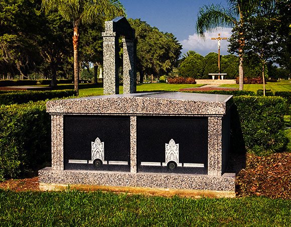 Granite columbarium wall with niches