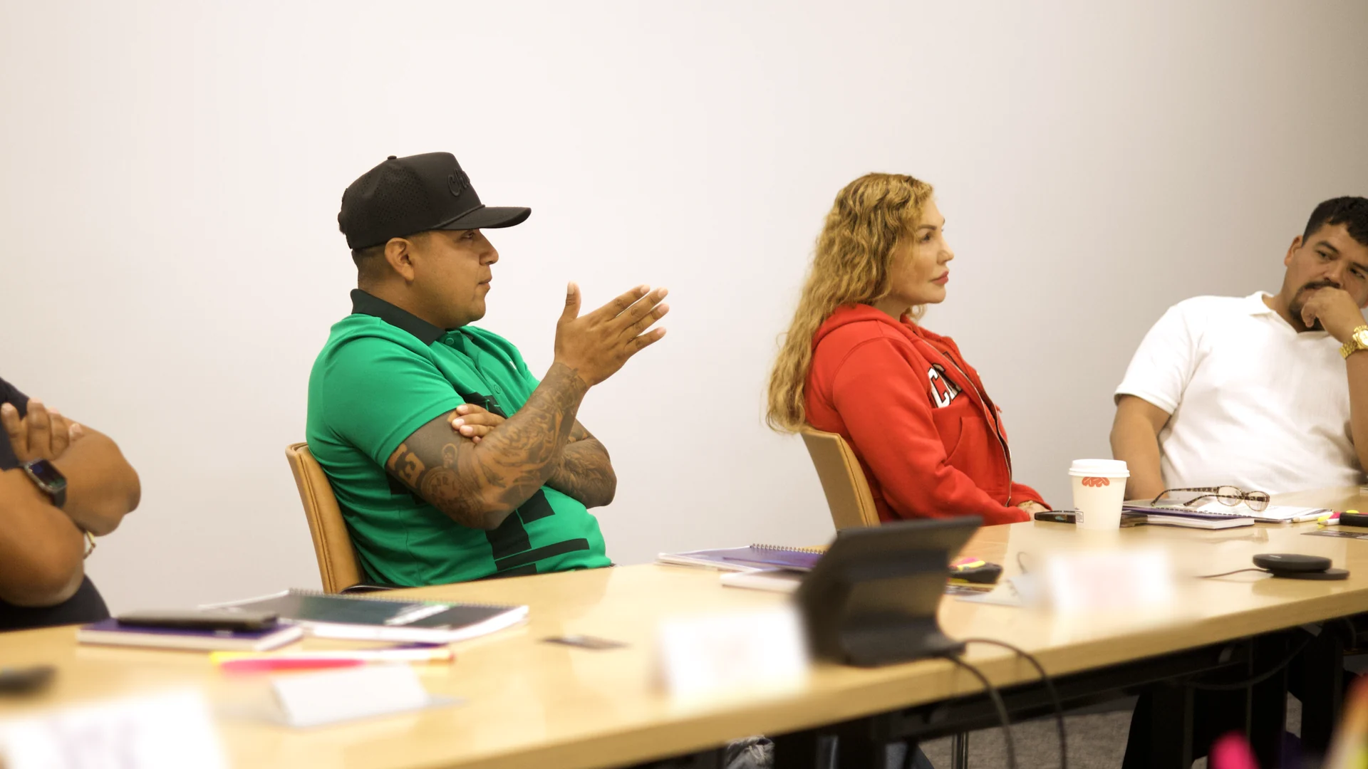Students talking through a question together during an Illinois public adjuster class