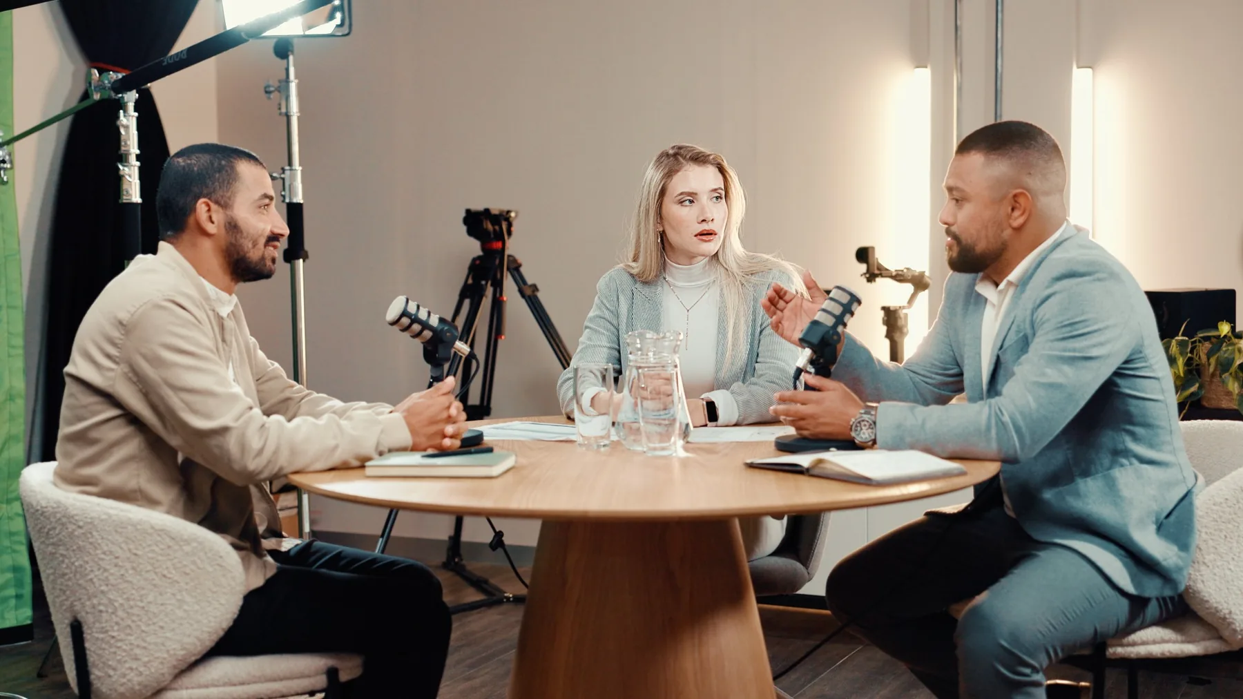 Professionals recording and producing a podcast discussion