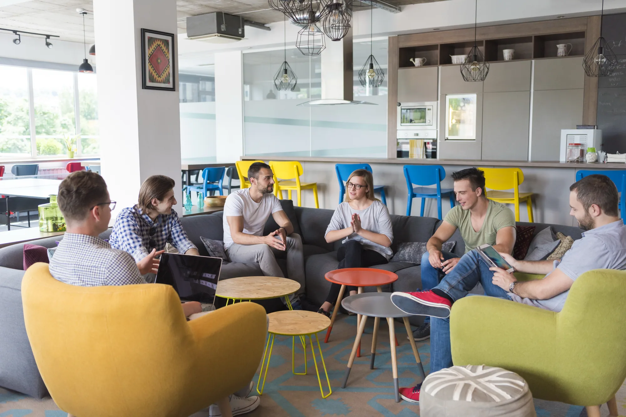 Creative team developing an automation workflow together