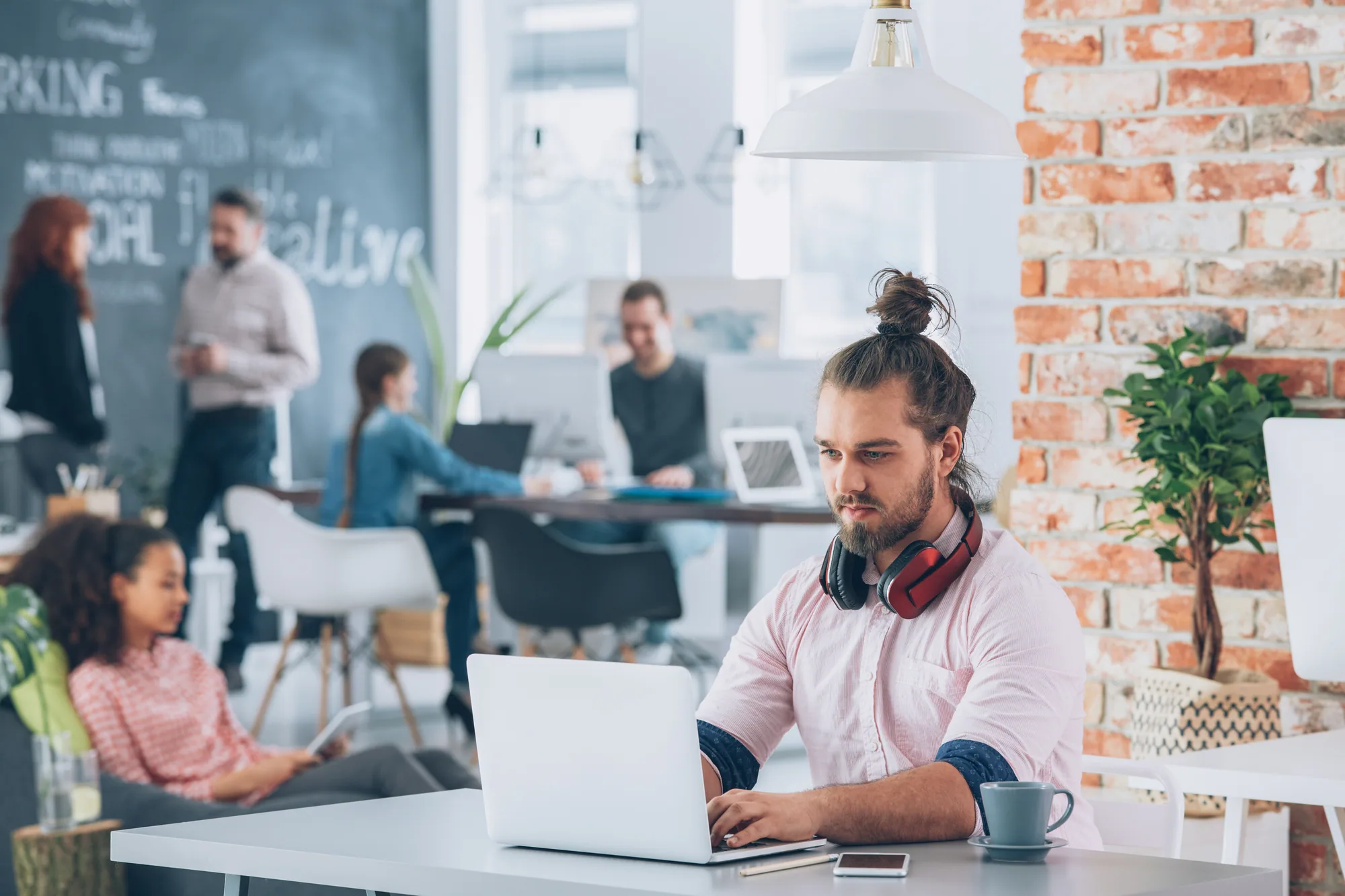 Professionals collaborating in a shared creative workspace