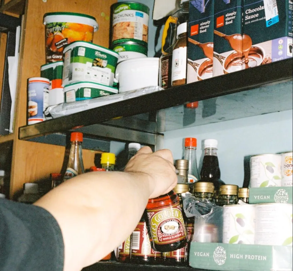 Chef choosing ingredients from restaurant inventory