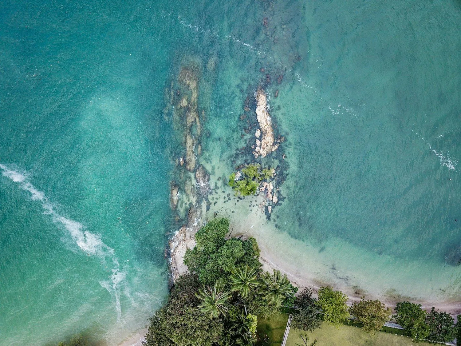 A marina at the edge of a coastal town