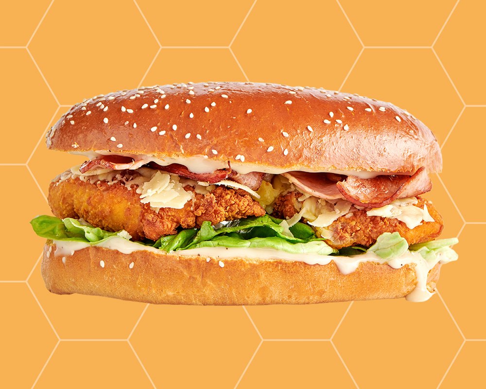 A crumbed chicken and bacon roll with lettuce