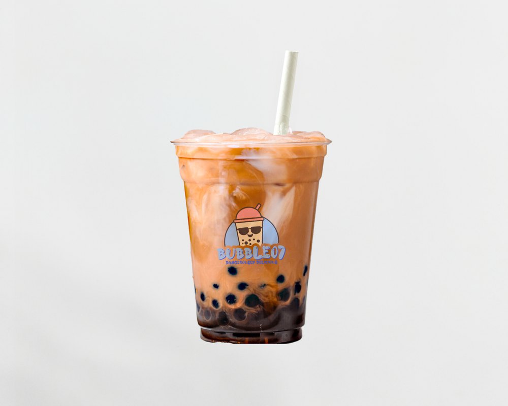 A brown sugar bubble tea in a Bubble07 cup