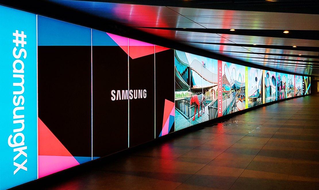 Samsung KX tunnel branded graphics at King's Cross London