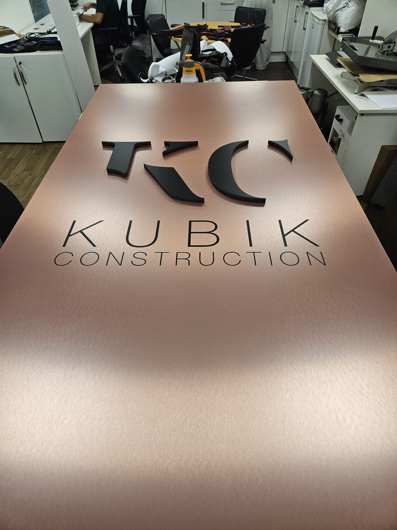 Workshop overview of fabricated Kubik Construction bronze panel