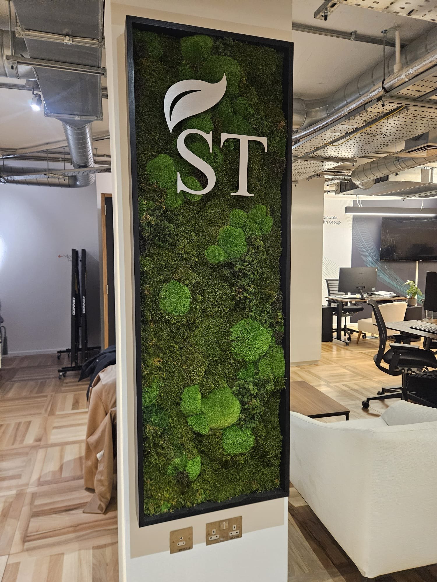 ST-branded office moss wall