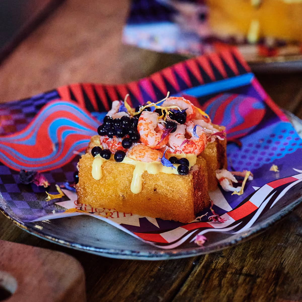 Een gerecht van topniveau op een bord in de Ultimate VIP Lounge