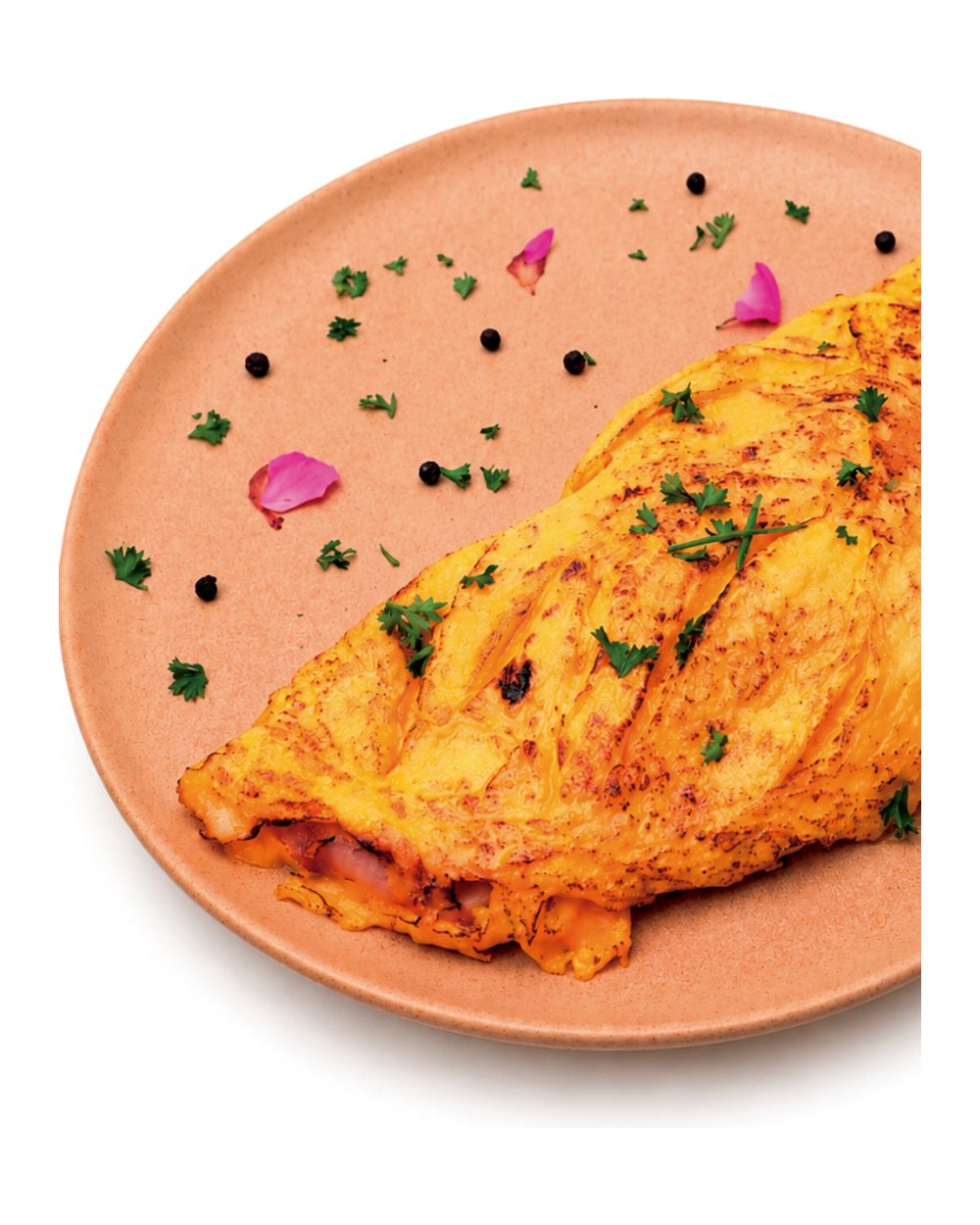 Omelette dorado con finas hierbas