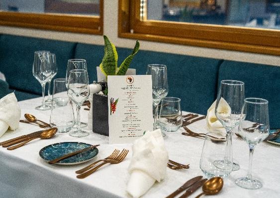 Table set for dinner on M/Y Harmony G