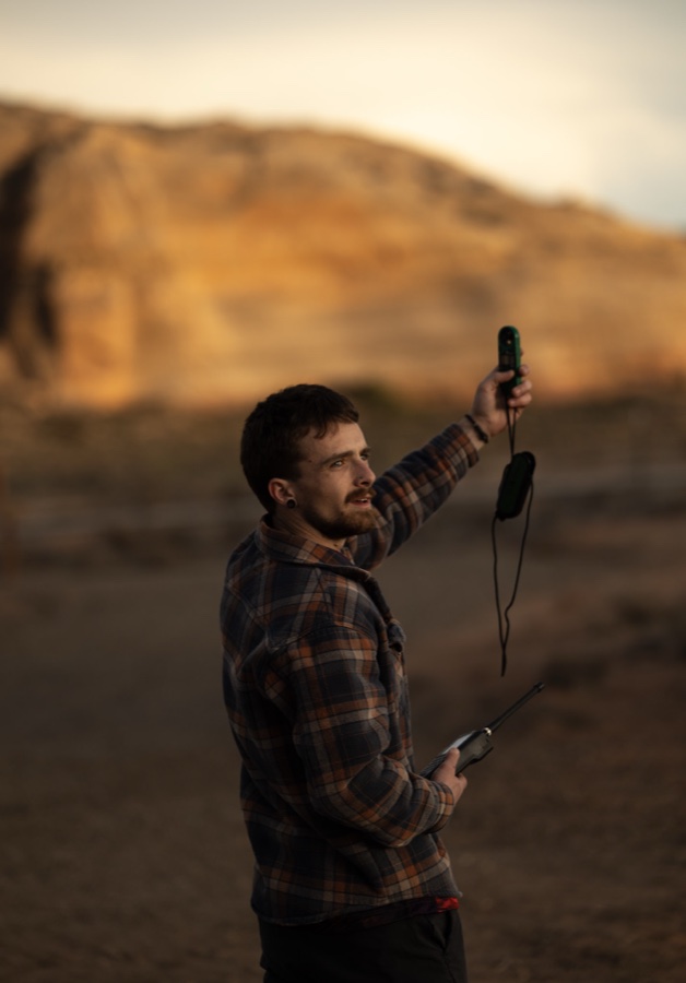 Checking wind on a handheld meter before the next load