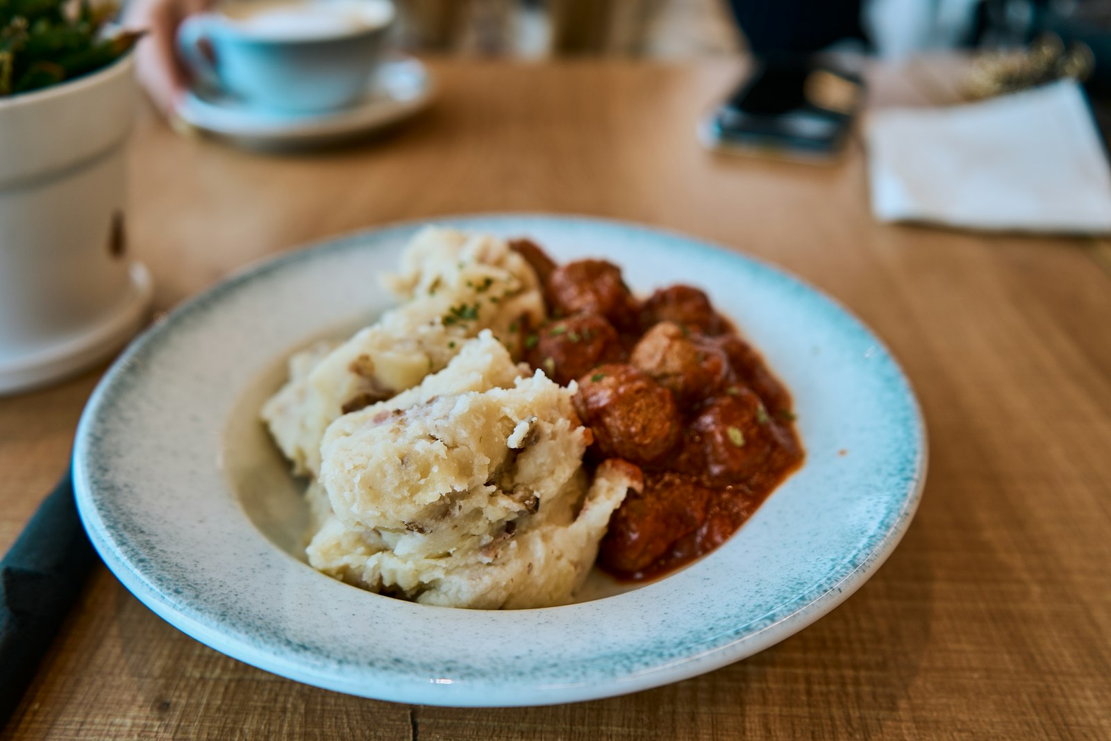 Sausages with mashed potatoes on a plate