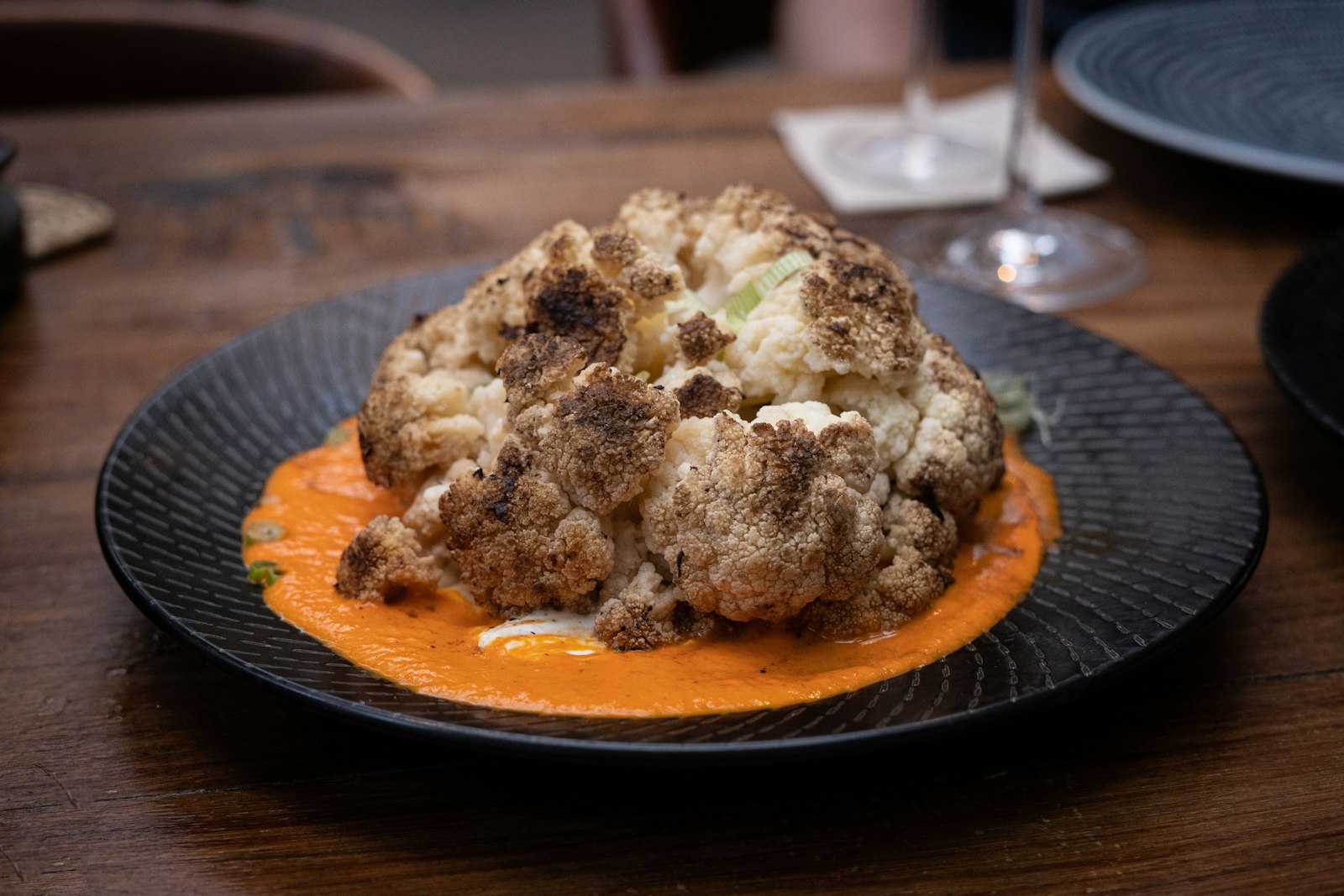 Roasted cauliflower with sauce on a plate