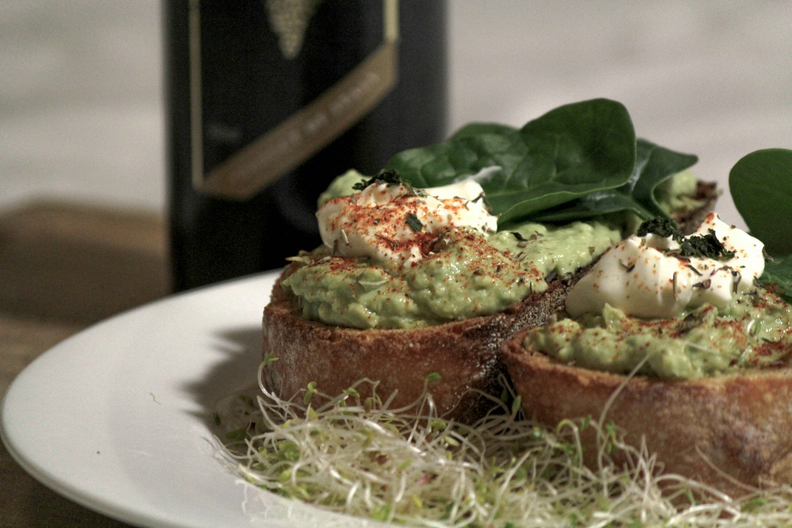 Toasts topped with sautéed greens