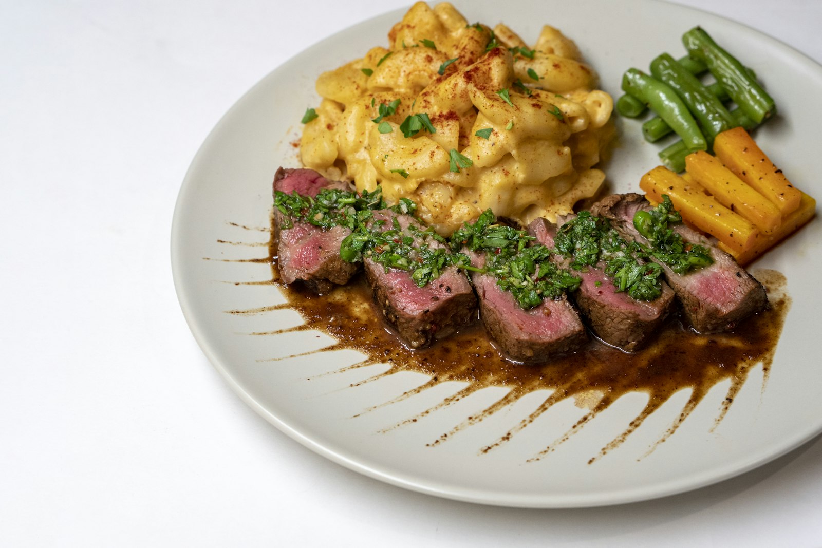 Sliced steak with chimichurri