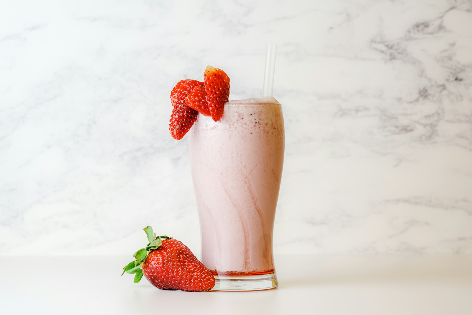 Pink shake in a tall glass
