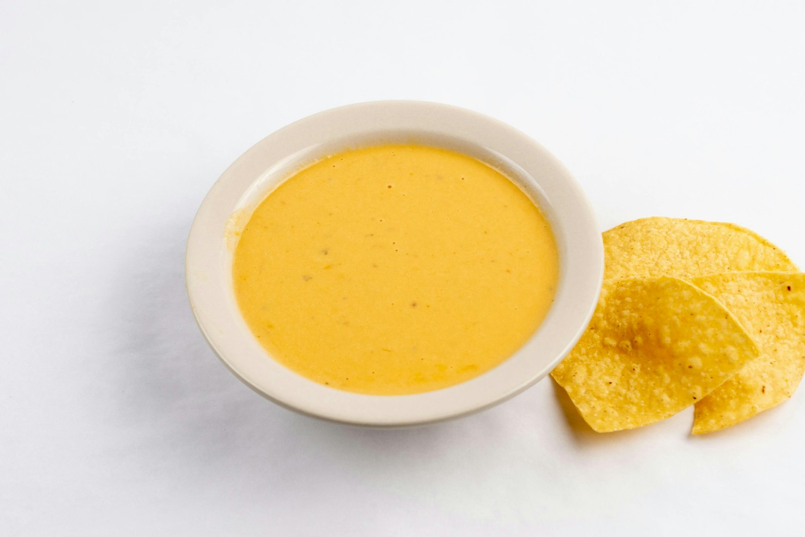 Bowl of queso with chips