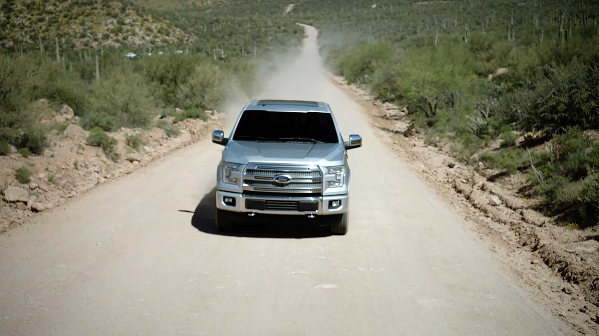 Ford F-150 driving a dusty desert road, Designed for the Desert