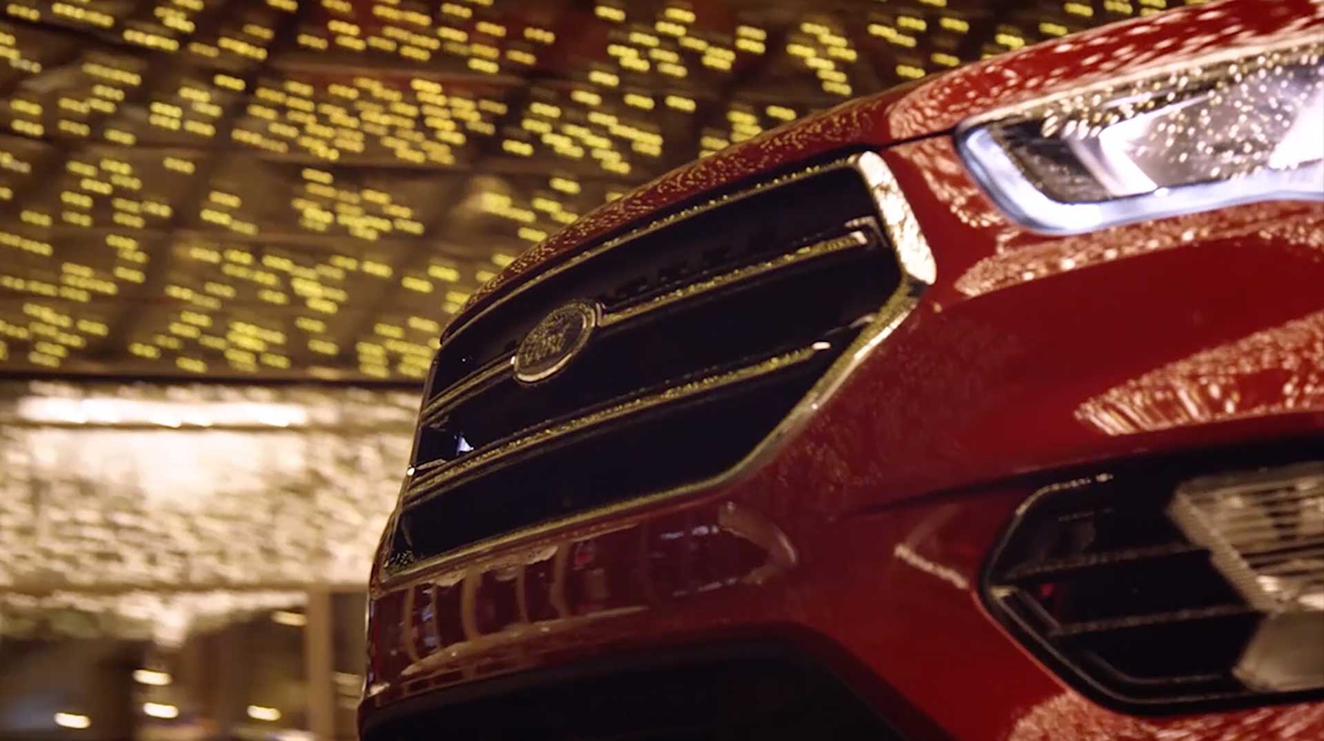 Close-up of a red Ford Escape under lights, Designed for the Desert