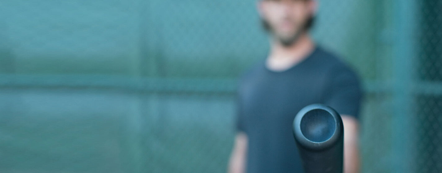 Madison Bumgarner holding a bat, Ford Defy Expectations campaign