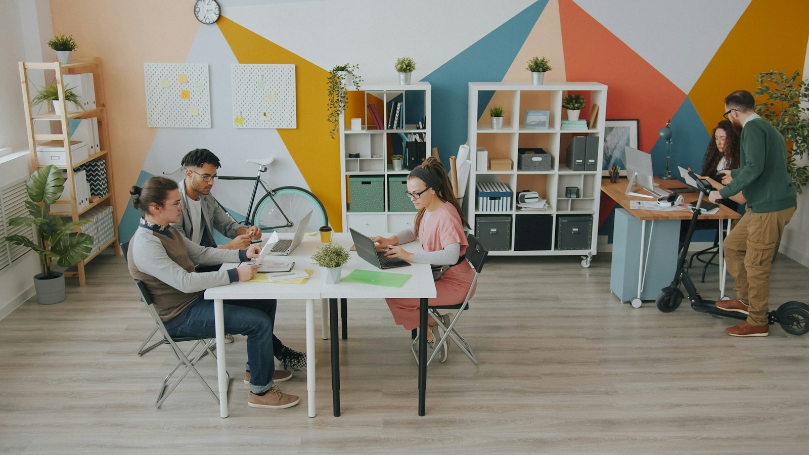 Colourful office with geometric wall patterns