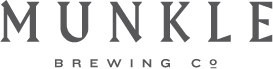 Munkle Brewing Co. logo with stylized uppercase letters.