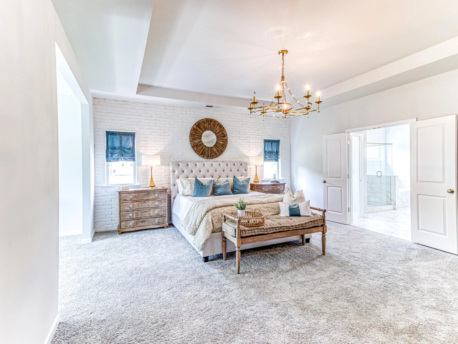 Primary bedroom with tray ceiling