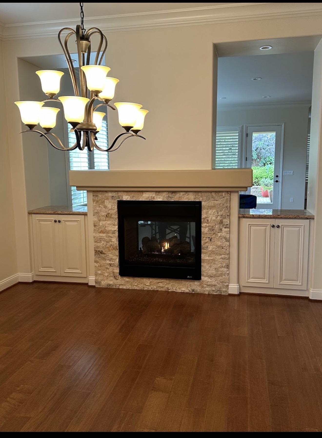 Interior painting and cabinet finish around a fireplace by Coastline Painting