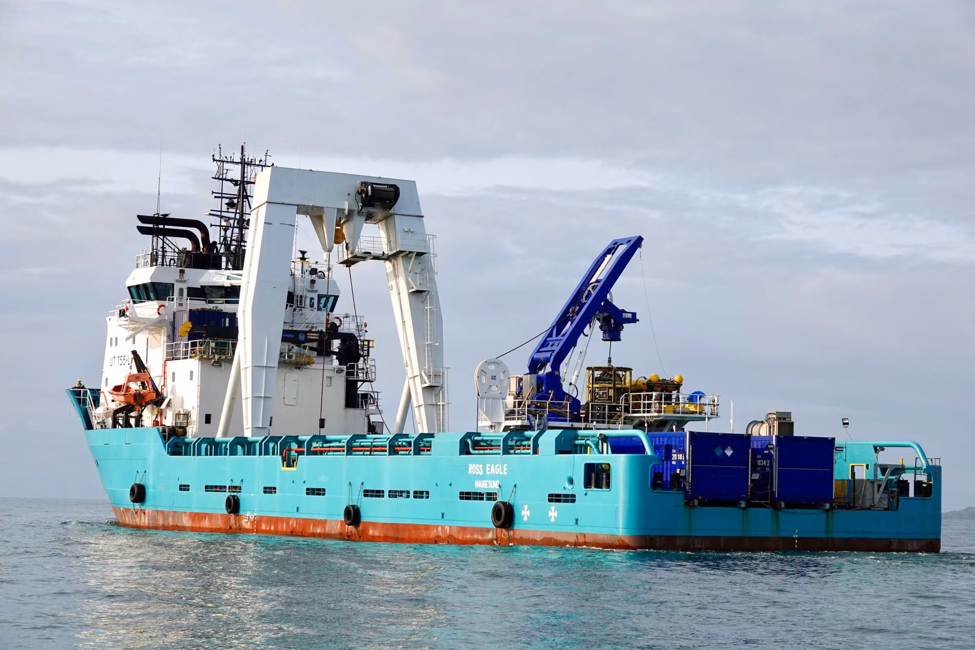 Survey vessel Ross Eagle at sea with its A-frame and crane on deck