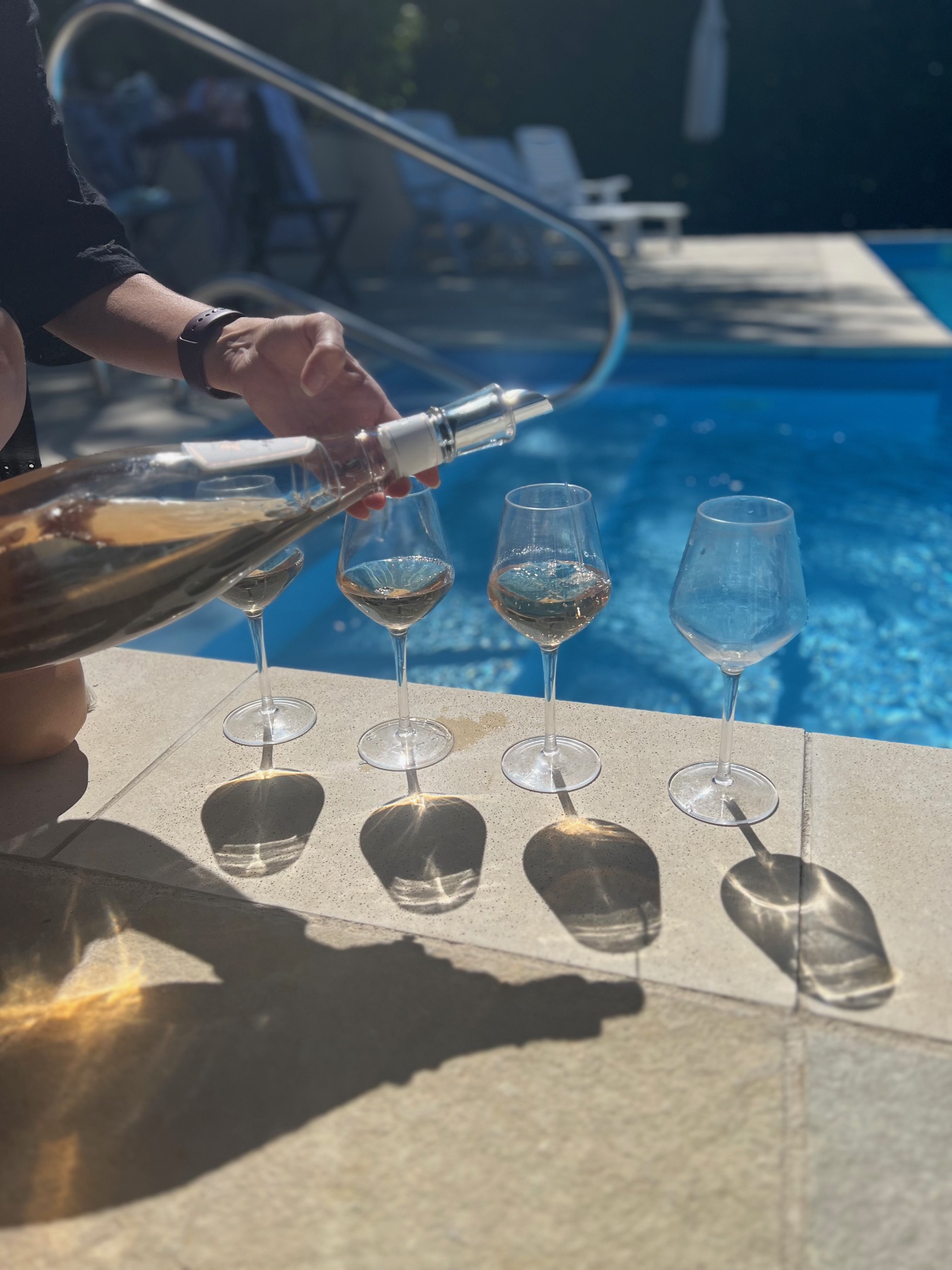 Wine tasting beside the pool at Cascina Berchi
