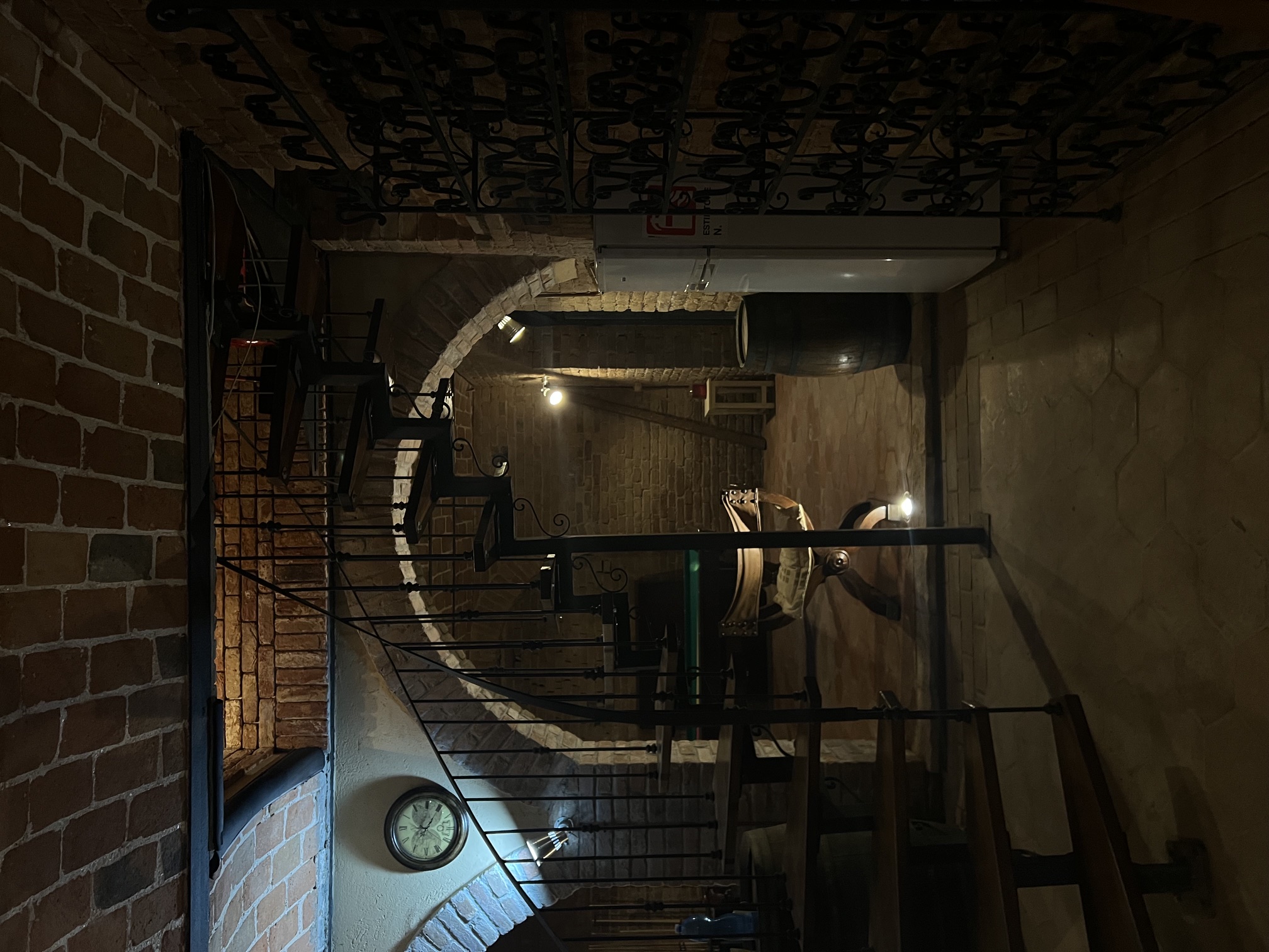 Restored brick and stone interior at Cascina Berchi