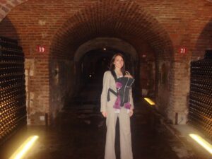Angela Cochran visiting an underground Champagne cellar